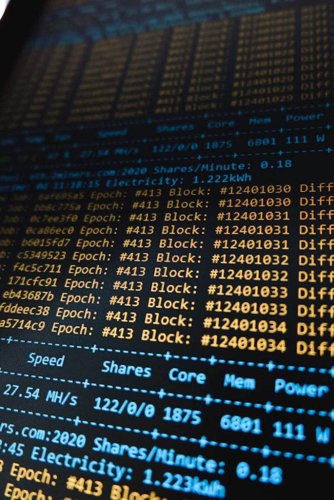 pexels-photo-9464856 Detailed view of a cryptocurrency mining software interface displaying real-time data on a computer monitor.